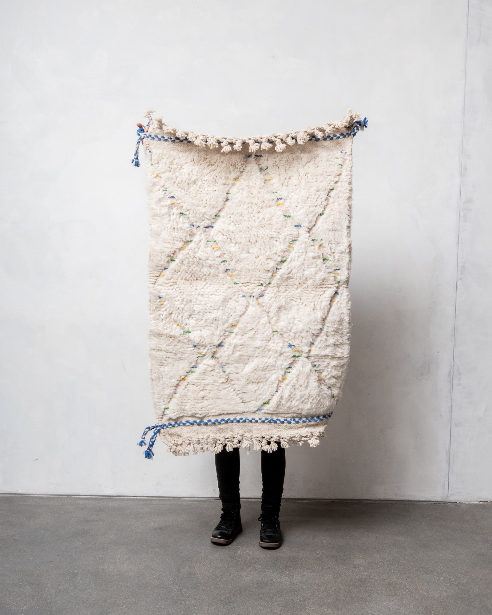 Modern, designer, handcrafted Berber rug from Morocco. Beniourain carpet with beautiful colours and patterns and fluffy wool texture.
